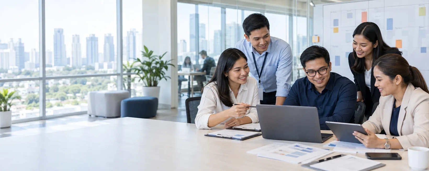 Operations team reviewing platform work in a bright business office